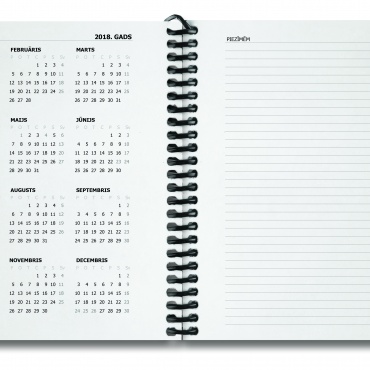 plānotājs metāla spirālē atvērumā - kreisajā lapā visi kalendārie mēneši ar datumiem